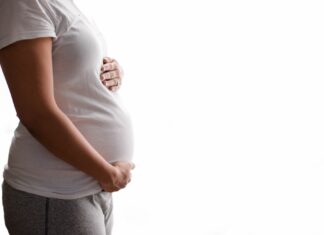 Does reproduction influence epigenetic aging in younger women? Study: Pregnancy is linked to faster epigenetic aging in young women. Image Credit: Maryna Chupilka/Shutterstock.com