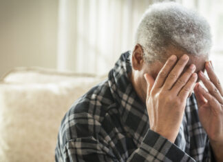 Report: Older adults face racial disparities in mental health issues, care Image of depressed or anxious older adult with head in hands