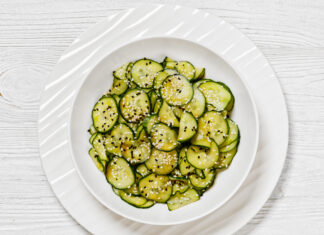 Nutritionists Explain Pros and Cons of Viral TikTok Cucumber Salad Trend Japanese Cucumber Salad in a white bowl