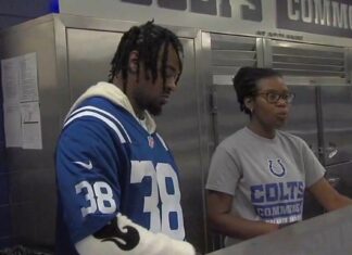 Colts players serve students meals at school to promote healthy eating Colts players serve students meals at school to promote healthy eating