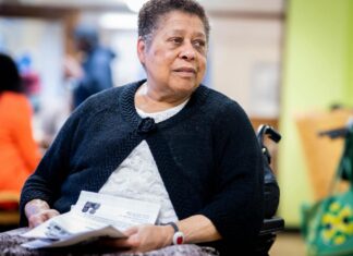 Older adults are deeply dissatisfied with health care, report says older adult in a wheelchair