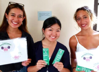 Student-led campaign promotes brain health among peers three students smiling