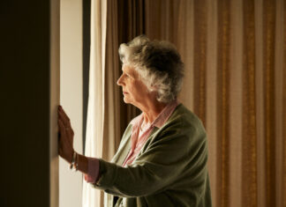Addressing social isolation and loneliness among older adults in Canada Pensive senior woman at home thinking